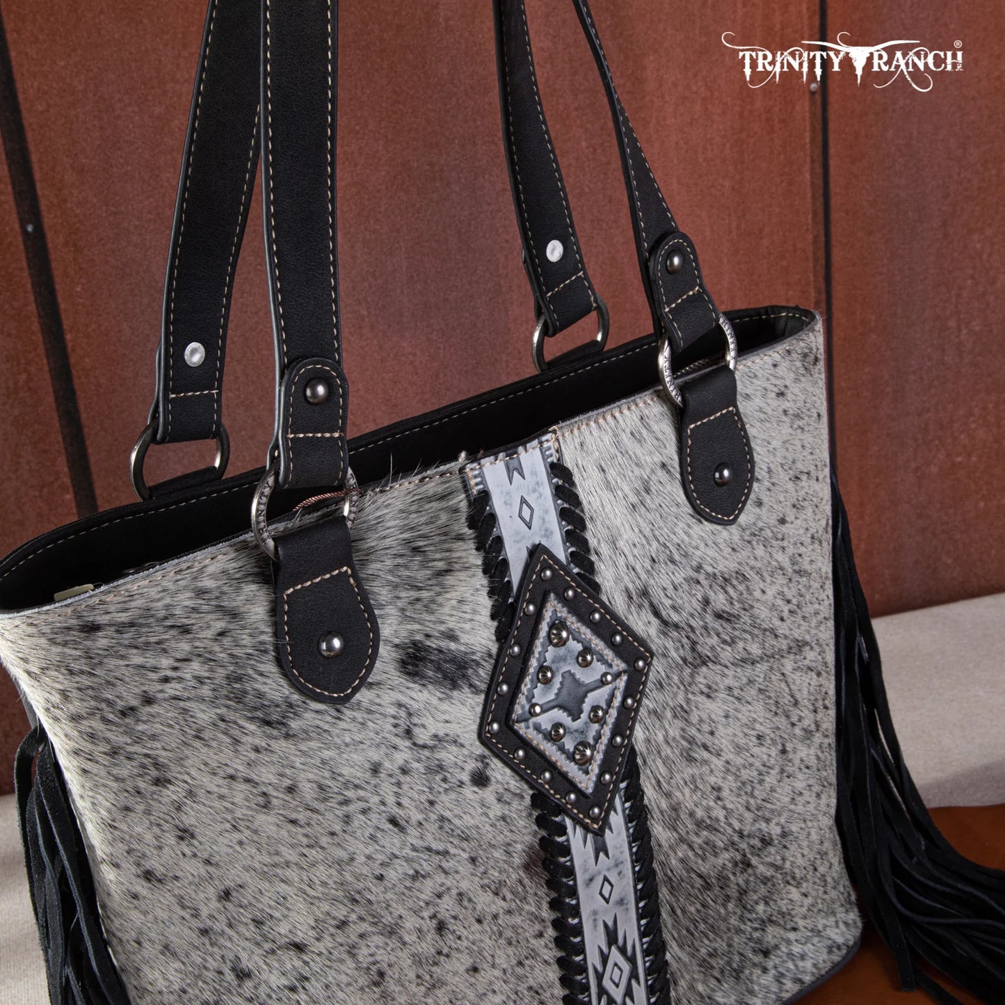 Trinity Ranch Hair On Cowhide Concealed Carry Tote - black and white hide