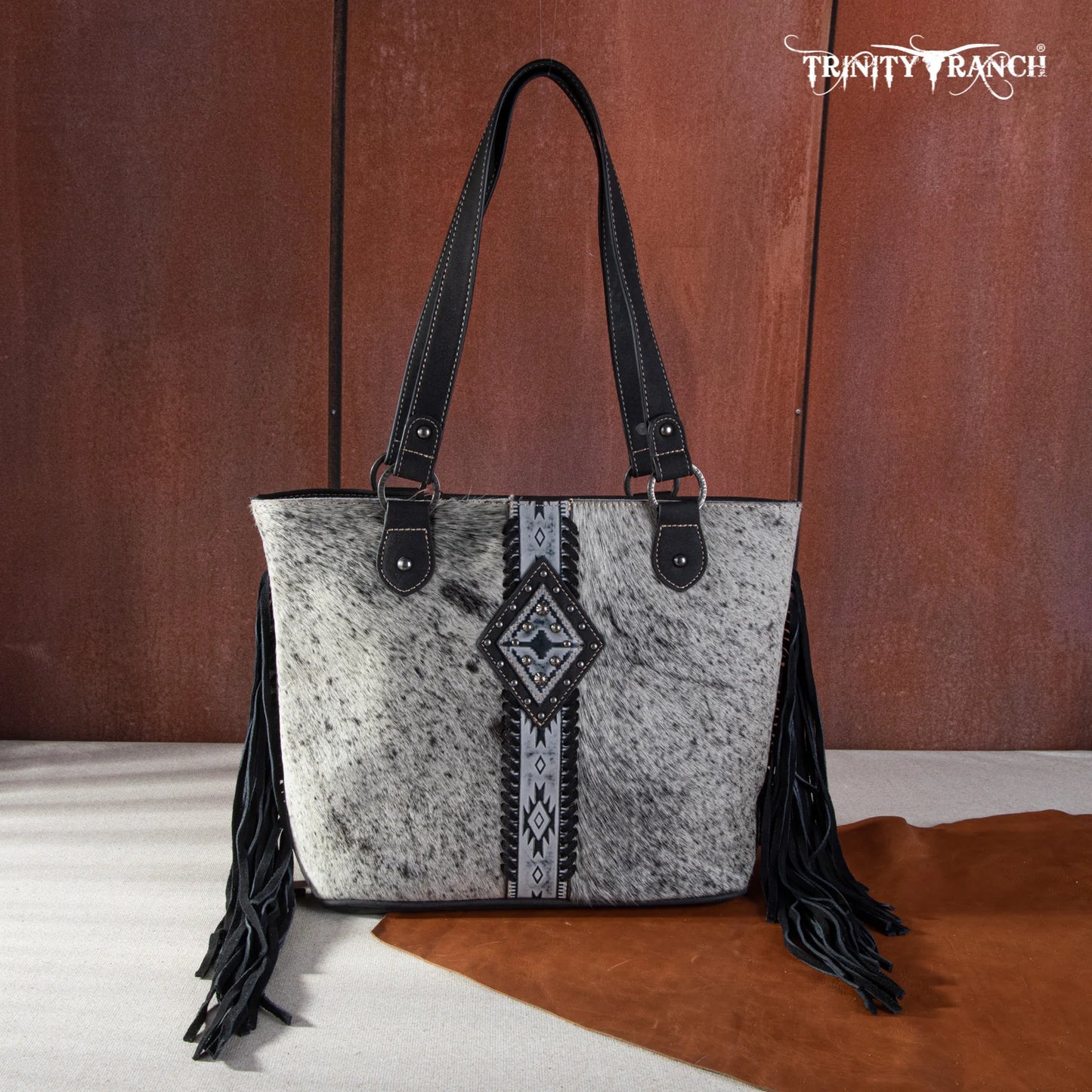 Trinity Ranch Hair On Cowhide Concealed Carry Tote - black and white hide
